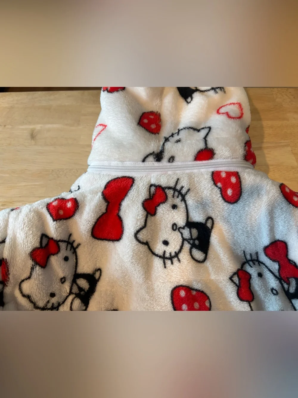 Hello Kitty White Plush Zip-Up Hoodie with Red Accents and Pink Fur Hood Trim